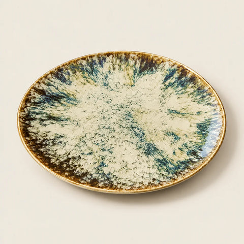 Assiette creuse Maka porcelaine — vue légèrement inclinée