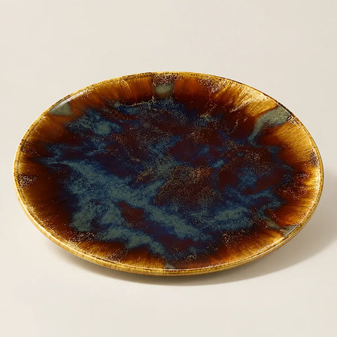 Assiette Volcano porcelaine marron — vue légèrement inclinée