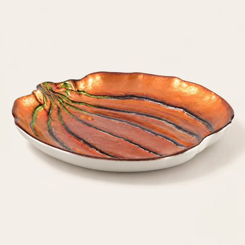 Assiette citrouille orange — vue légèrement inclinée