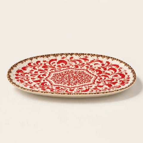 Assiette Palazzo porcelaine rouge — vue légèrement inclinée