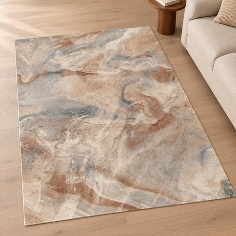 Tapis Carrare abstrait recyclé — mise en situation illustrative avec canapé