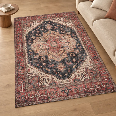 Tapis Nora rouge persan — mise en situation illustrative avec canapé