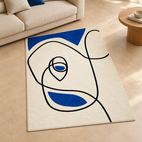 Tapis Otto géométrique recyclé — mise en situation illustrative avec canapé